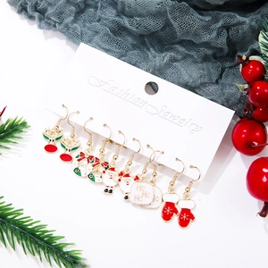 Detailed set of 6 Christmas drop earrings featuring Santa, reindeer and holly charms