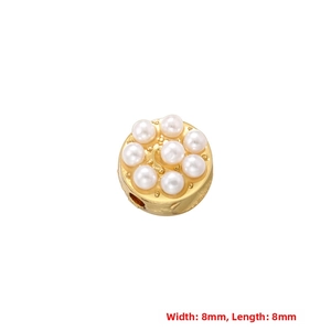 Close-up of 8mm vintage flower bead with gold metal and white pearl inlay details