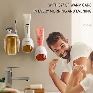 Portaspazzolino da parete con distributore di dentifricio e bicchieri color ambra