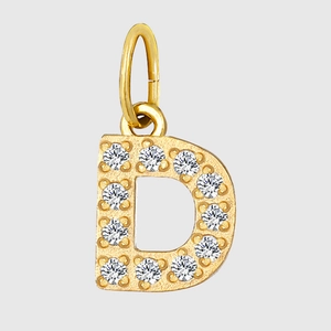 Macro shot of gold plated letter D pendant with sparkling zircon diamond setting
