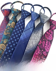 Detailed view of assorted men zipper ties with paisley and dot patterns size 52x7cm