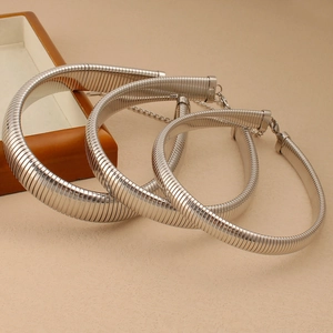 Detailed view of silver titanium steel snake chain choker set with lobster clasp closure