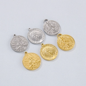 Religious pendant charms in gold and silver finish featuring Mary and bird engravings