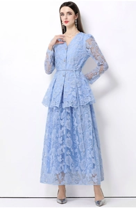 Detail view of light blue lace two-piece set featuring intricate floral embroidery and textures