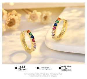 Detailed close-up of rose gold huggie hoop earrings with colorful AAA cubic zirconia