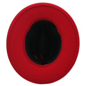 Red wool fedora hat with black interior lining and a wide brim for autumn fashion