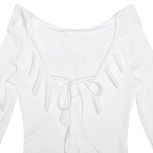 Close-up of white dress with ruffle V-neckline and tie-up front detail