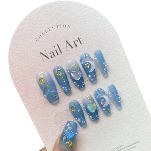 Handmade gradient blue press-on nails with 3D star, moon, heart and pearl decorations