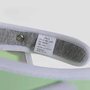 Close-up of the sun hat interior showing soft sponge padding and material care labels