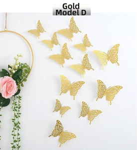 Set of 12 gold hollow butterfly wall stickers with 3D carving in various sizes
