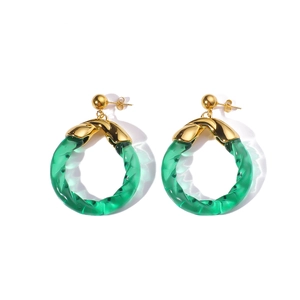 Green translucent acrylic spiral earrings with gold metal stud in minimalist style