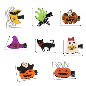 Set of 8 Halloween hair clips including bat, ghost, and pumpkin designs with measurements