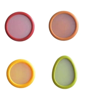 Set de 4 tapas de silicona de colores para sellar recipientes de frutas y verduras
