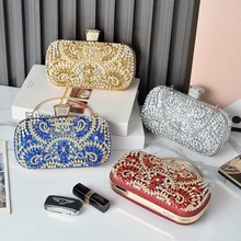 Detailed view of four acrylic evening bags with ornate crystal patterns and diamond clasps