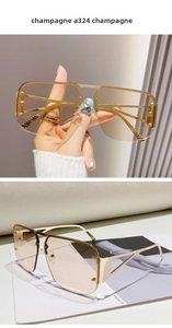 Detail of semi-rimless pilot sunglasses with champagne gradient lenses and metal frame