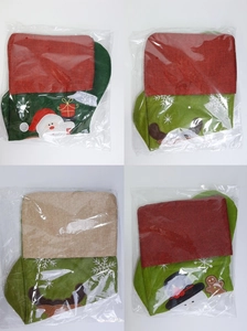 Set of four festive Christmas stockings with Santa, reindeer and snowman character patterns