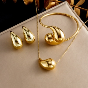 Bijoux En Acier Inoxydable Plaqué Or Avec Collier Boucles D'oreilles Et Bracelet Design Goutte D'eau Creuse Élégante Pour Femme