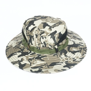 Close-up view of outdoor camouflage fishing hat featuring wide brim and breathable mesh