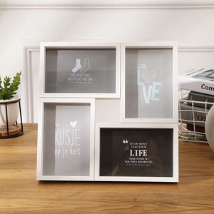 White wooden 4-opening collage picture frame for 4x6 photos in a minimalist Nordic style