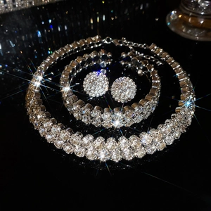 Macro shot of sparkling silver double-layer necklace set with round diamond crystals