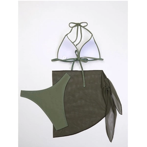 Detailed flat lay of olive green 3-piece bikini set with sheer mesh cover-up skirt