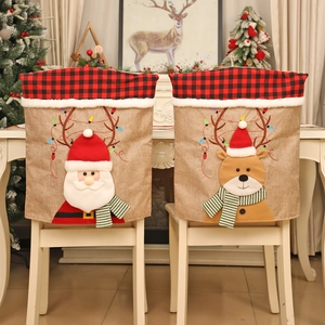 Linen Christmas chair covers featuring Santa and reindeer with red plaid details