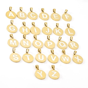Detailed collection of 26 round golden letter pendants with white shell inlay A-Z