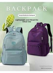 Waterproof nylon backpack in mint green and purple colors with multiple zip pockets