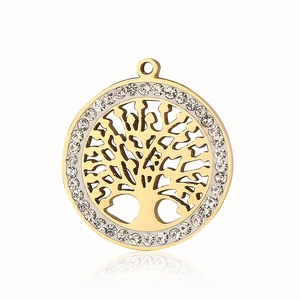 Detailed view of a gold round Tree of Life pendant with sparkling rhinestones and cutouts