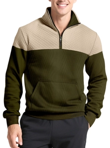Close-up of khaki quilted texture and olive green fabric on men's quarter-zip polo sweatshirt