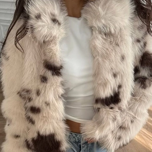 Faux fur animal print jacket in cream and brown with long hair plush texture for women