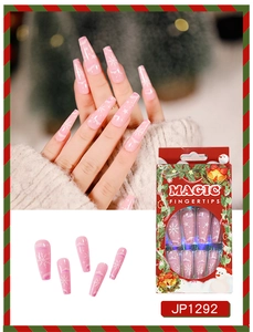 Detail view of long pink Christmas press on nails with clouds and snowflakes pattern