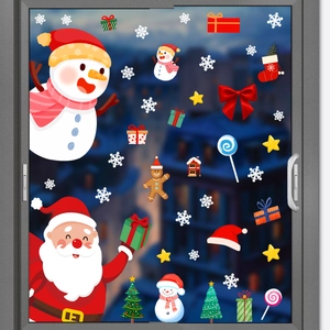 Detail of Christmas window stickers with Santa, snowman and snowflake PVC decals