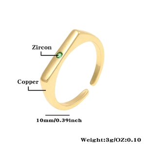 Detail view of square copper ring with 10mm width and green zircon stone setting