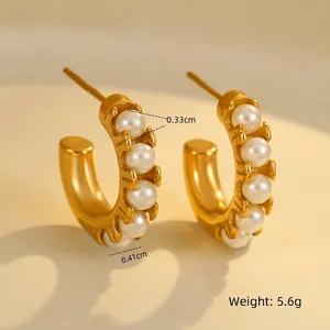 Detail view of 18K gold-plated C-shaped earrings with embedded white pearls and dimensions