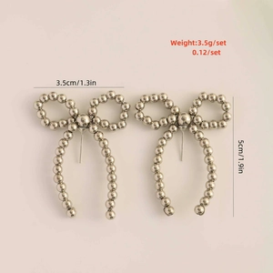 Silver bow earrings with metal beads featuring size 3.5cm width and 5cm height dimensions