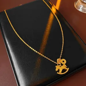 Luxurious gold-plated horse necklace set with fine craftsmanship on black leather box