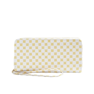 White long clutch wallet with yellow clover print and matching wristlet strap