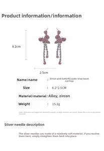 Boucles d'oreilles papillon roses avec dimensions de 8,2cm par 2,5cm et détails matières