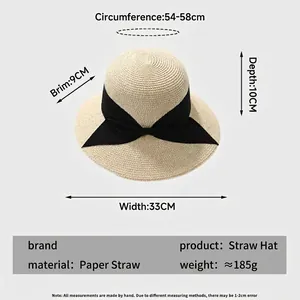 Women wide brim paper straw beach sun hat with a decorative black swallowtail bow tie