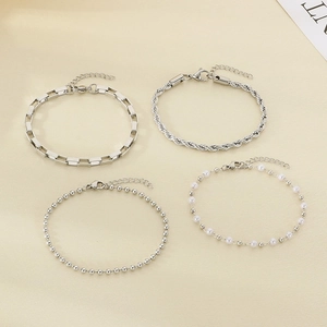 Detailed set of four silver-tone chains including twisted, box, bead, and pearl styles