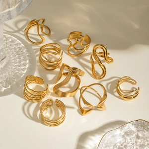 Set of minimalist gold plated stainless steel rings in assorted geometric designs