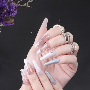 Long ballerina press-on nails with luxury rainbow rhinestones and silver glitter finish