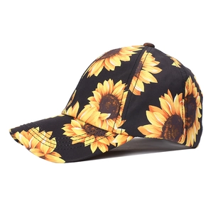 Women's black sunflower baseball cap with criss-cross elastic ponytail hole for outdoors