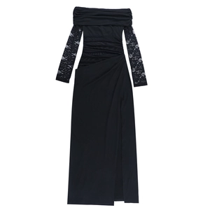Detail of sheer black lace sleeves and off-the-shoulder neckline on the slim maxi dress