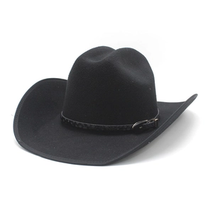 Detail of black cowboy hat with a thin leather decorative band and golden metal buckle