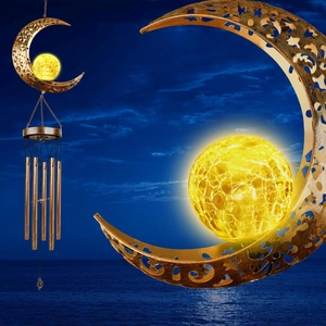 Solar powered metal moon wind chime with glowing glass ball and hollow carved details