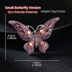 Detail of vintage butterfly brooch with purple crystals and dimensions 7.0x4.9cm