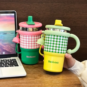 Plaid stainless steel insulated coffee mugs with straw handles in pink and yellow designs