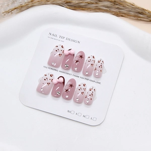 Handmade press-on nails with red-brown leopard print, stars, and 3D pink bow details